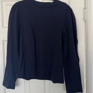 Deccan Taylor puffed knit top